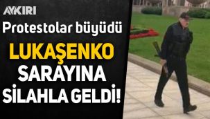 Belarus Başkanı Lukaşenko, çelik yelek ve elinde silahla saraya gitti