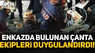 Enkaz altından çıkarılan çanta ekipleri duygulandırdı!