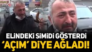 Elindeki simidi gösterdi, 'Açım' diye ağladı!