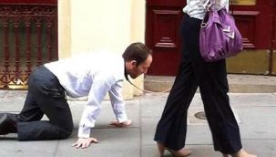 Karantinadan kaçmak istedi, kocasına tasma takıp gezdi!