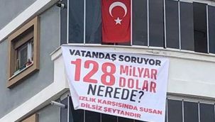 MHP eski başkanının astığı ‘128 milyar dolar nerede?’ afişi, polisler tarafından kaldırıldı