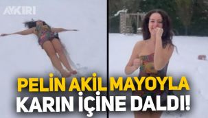 Pelin Akil bornozunu çıkardı, mayoyla karın içine daldı