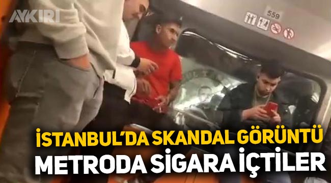 İstanbul'da metrodaki yolcuların uyarısına rağmen sigara içtiler