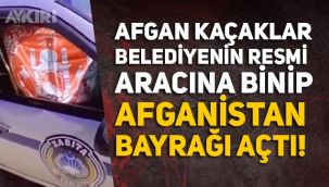 Belediyenin zabıta arabasına binip Afganistan bayrağı açan kaçağın görüntüleri tartışma yarattı