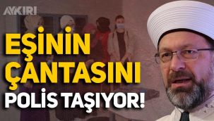 Diyanet İşleri Başkanı Ali Erbaş'ın eşi Seher Erbaş'ın çantasını koruma polisi taşımış