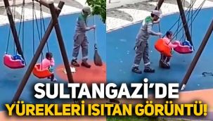 İstanbul'da yürekleri ısıtan görüntü: Hem temizlik yaptı, hem salıncaktaki küçük kızı salladı