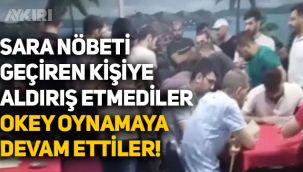 Kıraathanede sara nöbeti geçirdi, müşteriler aldırış etmeden okey oynamaya devam etti