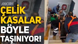 Nakliye firması çalışanları, kilolarca ağırlıktaki çelik kasaları evlere böyle taşıyor!