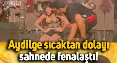 Aydilge, sıcaktan dolayı sahnede fenalaştı, eşi kucaklayıp sağlıkçıların yanına götürdü
