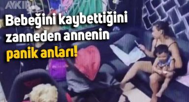 Kucağında duran bebeğini kaybettiğini zannetti, panik anları kameraya yansıdı
