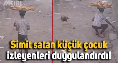 Simit satan küçük çocuğun köpeğe simit verdiği anlar izleyenleri duygulandırdı