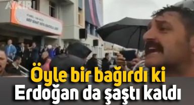 Erdoğan'ın yanında bağırarak şiir okuyan adam