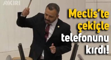 CHP'li vekil, Meclis kürsüsünde çekiçle cep telefonunu kırdı