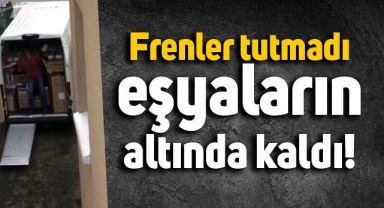 Frenler tutmayınca araçta bulunan eşyalar genç adamın üstüne devrildi
