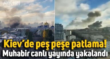 Kiev'de peş peşe patlama sesleri duyuldu, muhabir canlı yayında patlamaya yakalandı