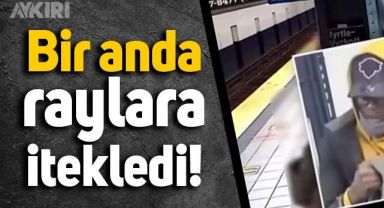 New York'ta bir adam metro istasyonunda raylara itildi