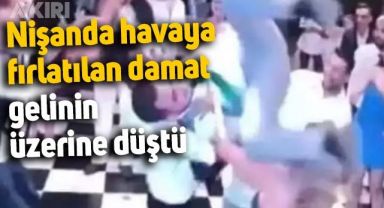 Nişanda havaya fırlatılan damat, gelinin üzerine düştü