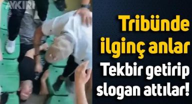 Tribünde bayılan arkadaşlarının başında tekbir getirdiler