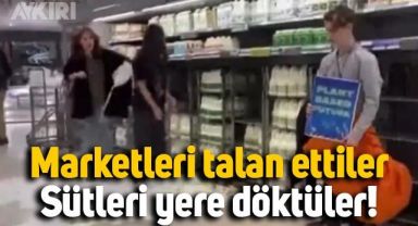 Veganlar marketleri talan etti: Sütleri yere döktüler