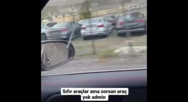 Bir vatandaş, sıfır araçların stoklandığı alanı böyle görüntüledi