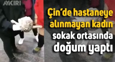 Çin'de hastaneye kabul edilmeyen kadın sokak ortasında doğum yaptı