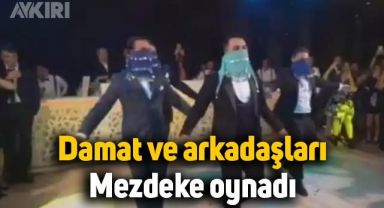 Damat ve arkadaşları gelinin karşısında mezdeke oynadı
