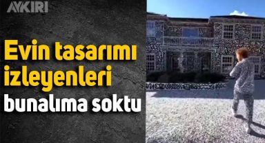 Evini tamamen siyah beyaz renk ve desenlerle tasarladı