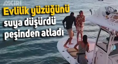 Evlilik teklifi edeceği sırada yüzüğü suya düşürdü, peşinden atladı