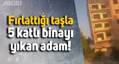 Fırlattığı taşla beş katlı binayı yıkan adam