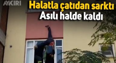 Hatay'da evine girmek için çatıdan halatla sarktı, asılı kaldı