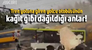 Hollanda'da tren yoluna giren yolcu otobüsü paramparça oldu