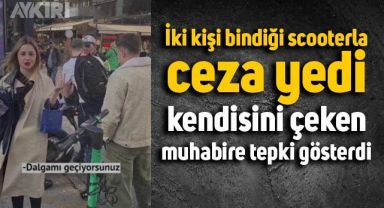 İki kişi bindikleri scooterla ceza yiyip kendilerini çeken muhabire tepki gösterdiler