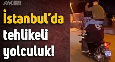 İstanbul'da motoru süren arkadaşının omzuna oturarak seyahat etti
