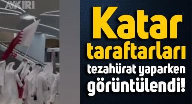 Katar milli takımı taraftarları bayraklarla tezahürat yaparken görüntülendi