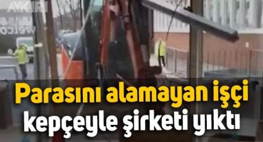 Parasını alamayan işçinin kepçeyle şirketi yıktığı anlar
