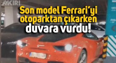 Son model Ferrari'yi otoparktan çıkarken duvara vurdu
