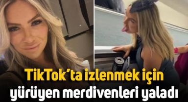 TikTok'ta izlenmek için yürüyen merdivenleri yaladı