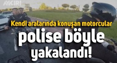 Trafikte kendi aralarında konuşan motorcuların polise yakalandığı anlar