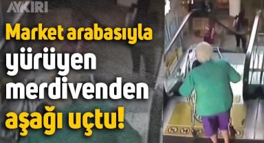 Yaşlı kadın market arabasıyla yürüyen merdivenden uçtu