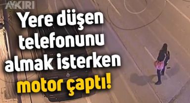 Yere düşen telefonunu almak isterken motor çarptı