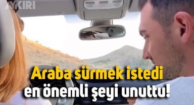 Araba sürmek için direksiyona geçti, çalıştırmayı unuttu.