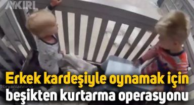 Erkek kardeşiyle oynamak için beşikten böyle kurtardı
