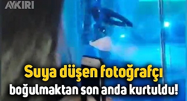 Fotoğrafçı havuza düştü, boğulmaktan son anda kurtuldu