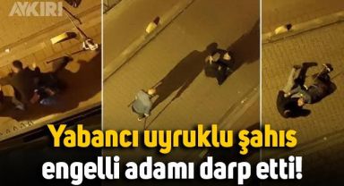 Koltuk değnekli adam ve yabancı uyruklu şahsın görüntüleri tepki çekti