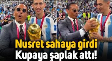 Nusret sahaya indi, Di Maria'nın elindeki Dünya Kupasına şaplak attı