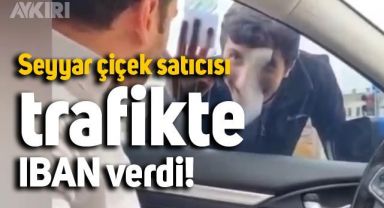  Seyyar çiçek satıcısının, tarfikte IBAN numarası verdiği anlar 