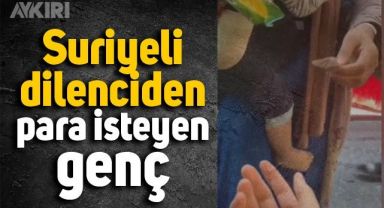 Suriyeli dilenciden para isteyen genç