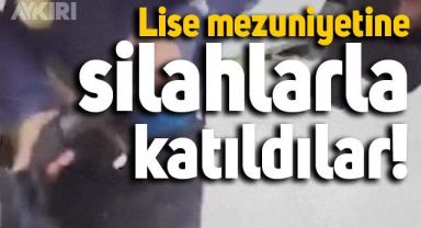 ABD'de lise mezuniyetine katılan öğrencilerin ellerindeki silahlar ülke gündemine oturdu.