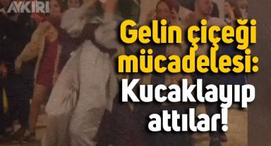 Düğünde gelin çiçeğini almaya çalışan kadın, böyle engellendi