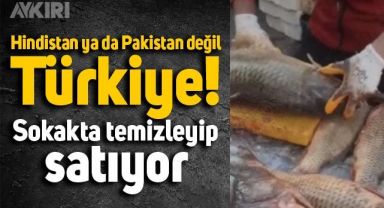 Sokakta inşaat eldiveni ile balık temizleyip satan adam şaşkınlık yarattı